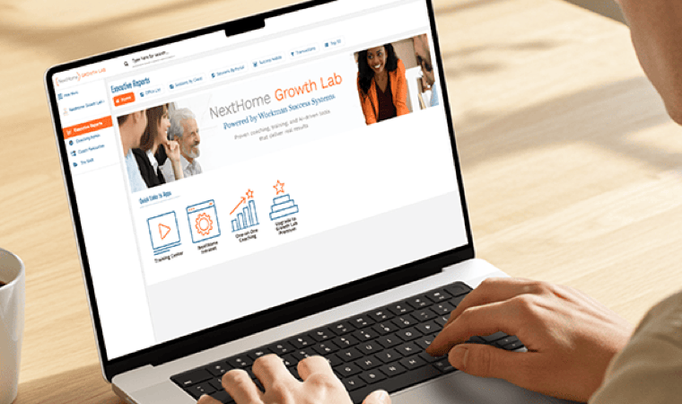 A professional uses a laptop that displays NextHome's Growth Lab web portal